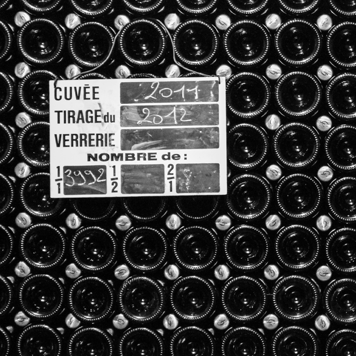 Bouteilles de Champagne en vieillissement dans les caves